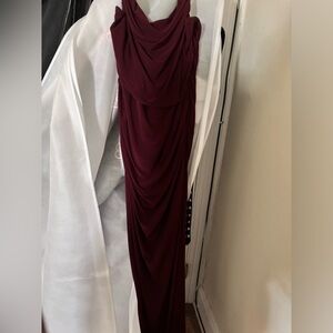 Size 22 
Burgundy dress
slit on the left side 
Comes with dust bag